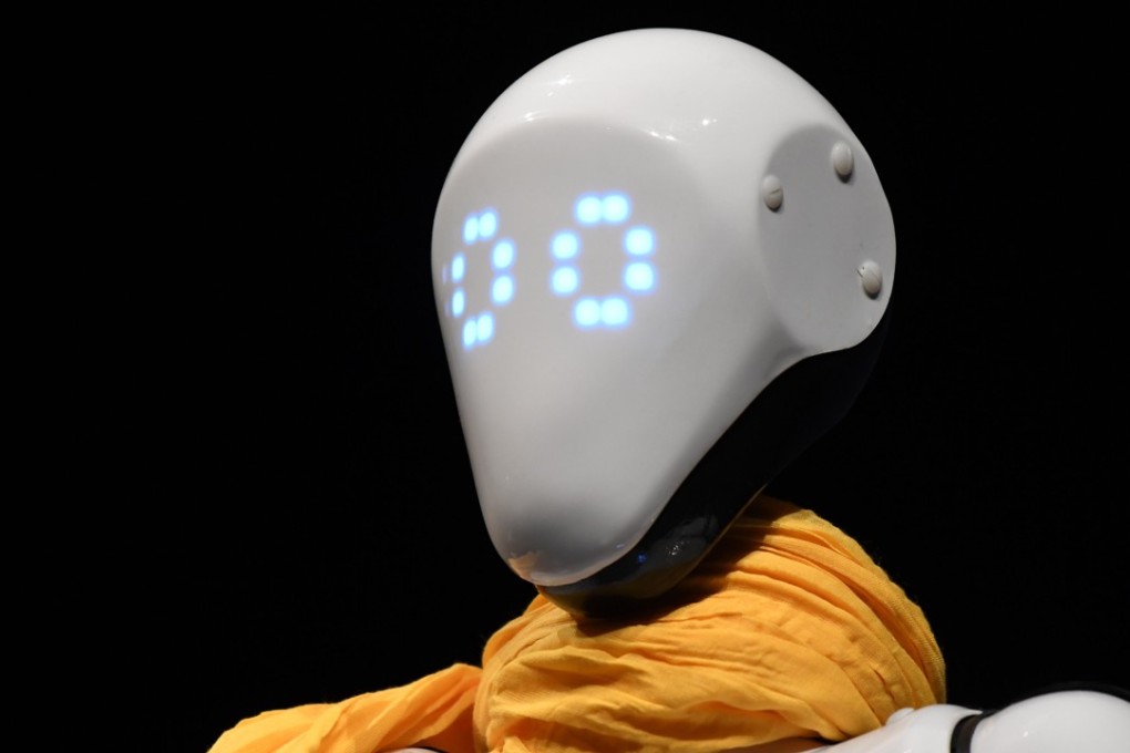 Tokyo is planning to employ robots to help tourists and visitors to the 2020 Tokyo Olympic Games. Pictured: A robot at a tech show in France in December. Photo: AFP