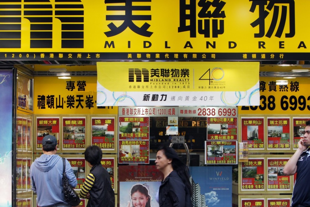 A Midland Realty outlet in Hong Kong. its chairman bought nearly 6 million shares of his company between December 27 and January 4. Photo: SCMP