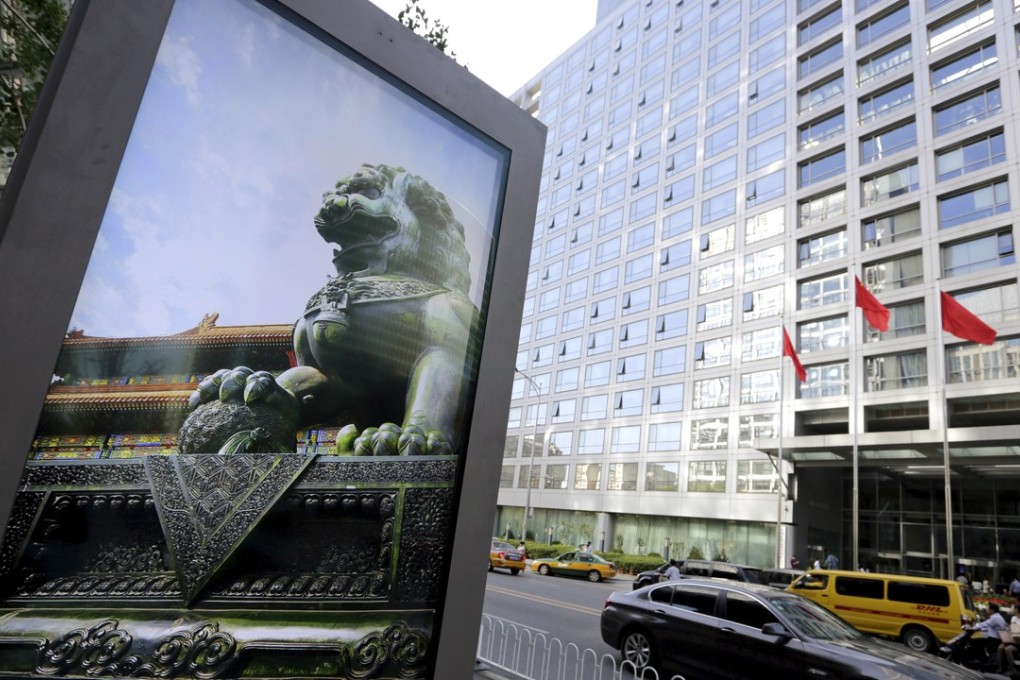 The headquarters of the China Securities Regulatory Commission in Beijing. The regulator requires Huatai to control the size of its cross-border business, which is not to exceed 20 per cent of its net capital, the company said. Photo: Reuters