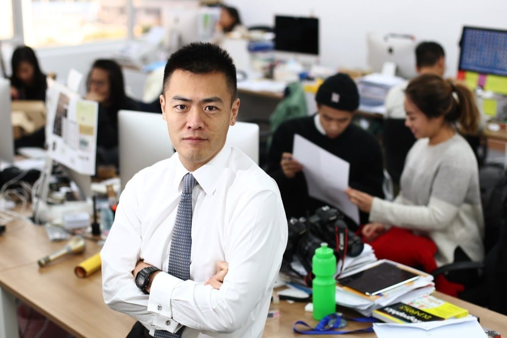 Outgoing Commission on Youth chairman Lau Ming-wai (centre) with staff at their office in Wan Chai. Photo: Nora Tam