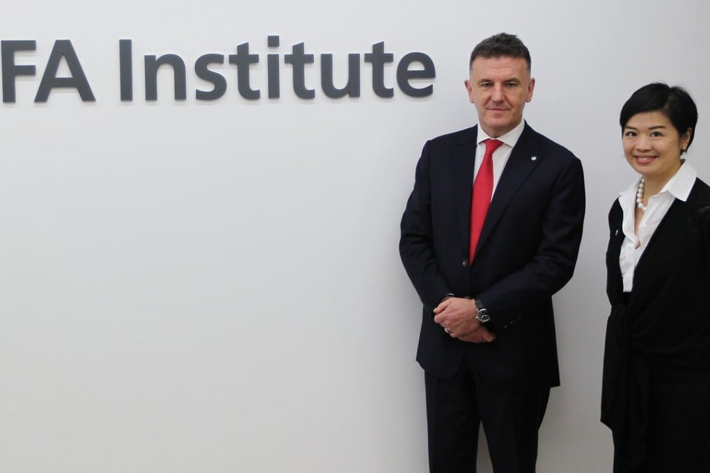Nick Pollard, (left) managing director for Asia-Pacific at the CFA Institute and Mary Leung Ka-yan, say there is little consistency in the level of reporting standards across the world. Photo: Roy Issa