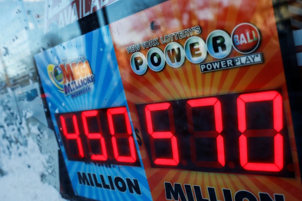 A sign advertising the Powerball lottery draw and Mega Millions grand prize outside a store in Port Washington, New York. Photo: Reuters