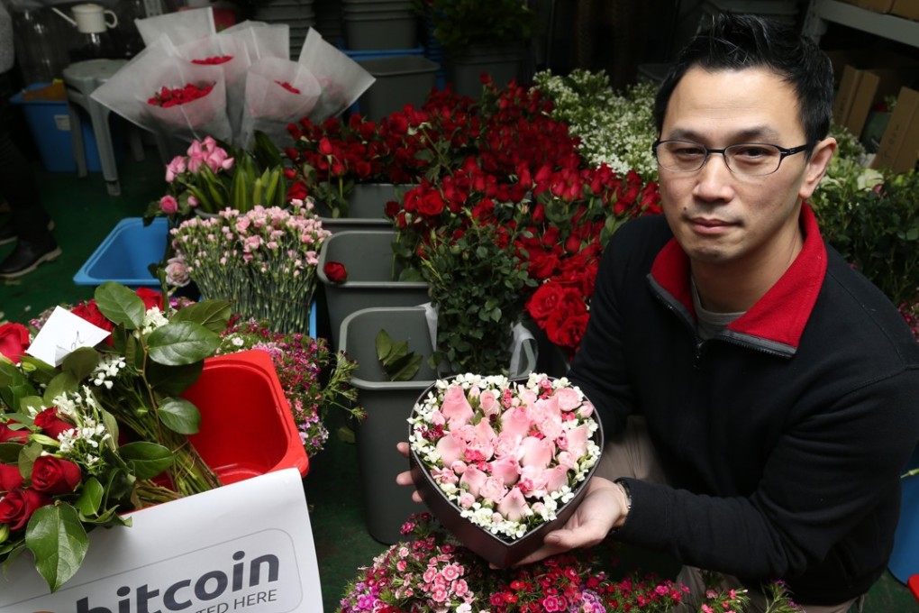 Leslie Wu Wai-leung, director of Hong Kong Flower Delivery, one of the first businesses in the city to accept payments using bitcoin. The company has seen a dozen transactions since 2014 using the digital currency. Photo: SCMP