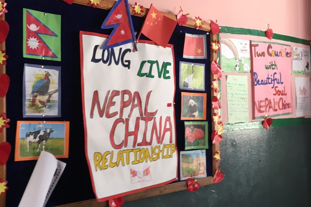 A poster on a message board outside the Confucius Classroom at the Learning Realm International School in Kathmandu promotes friendship between China and Nepal. Photo: Sarah Zheng