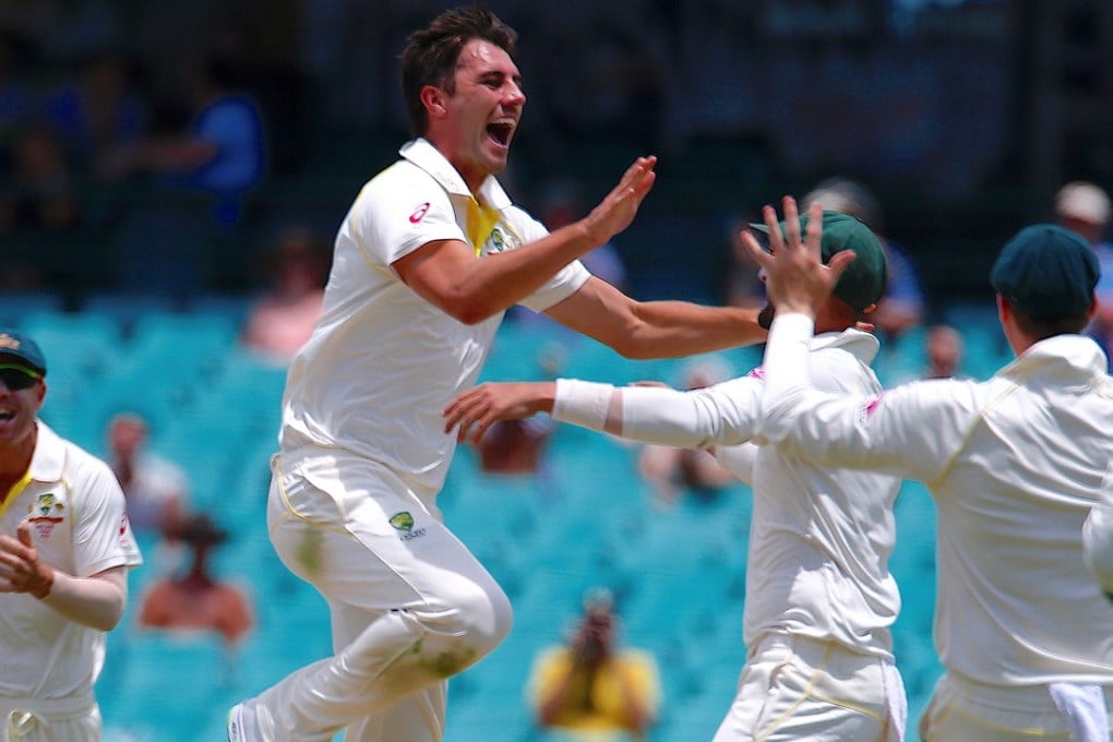 Australia’s Pat Cummins celebrates with teammates after dismissing England’s Jonny Bairstow during the fifth day of the fifth Ashes test match. Photo: Reuters