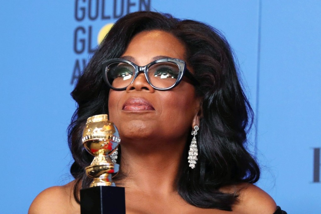 Oprah Winfrey holds the 2018 Golden Globe Cecil B. DeMille Award. The billionaire former TV host gave an impassioned speech calling for people to stand up to social injustice that has led to hopes that she will run for president in 2020. Photo: EPA