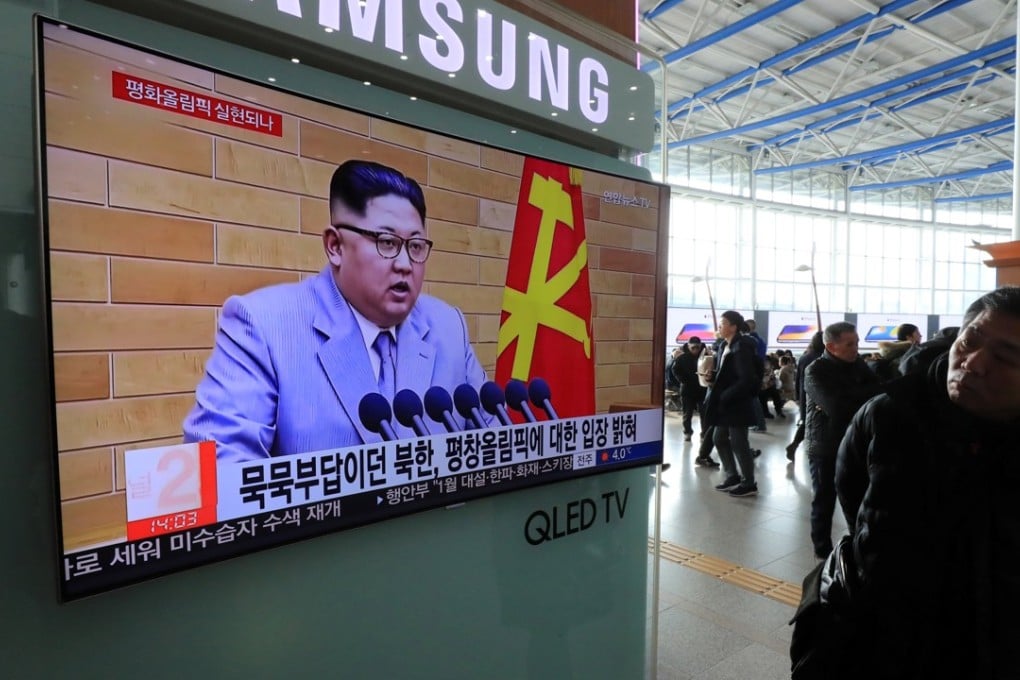 Seoul residents watch a news report on North Korean leader Kim Jong-un’s New Year’s Day speech. Photo: Yonhap via Reuters
