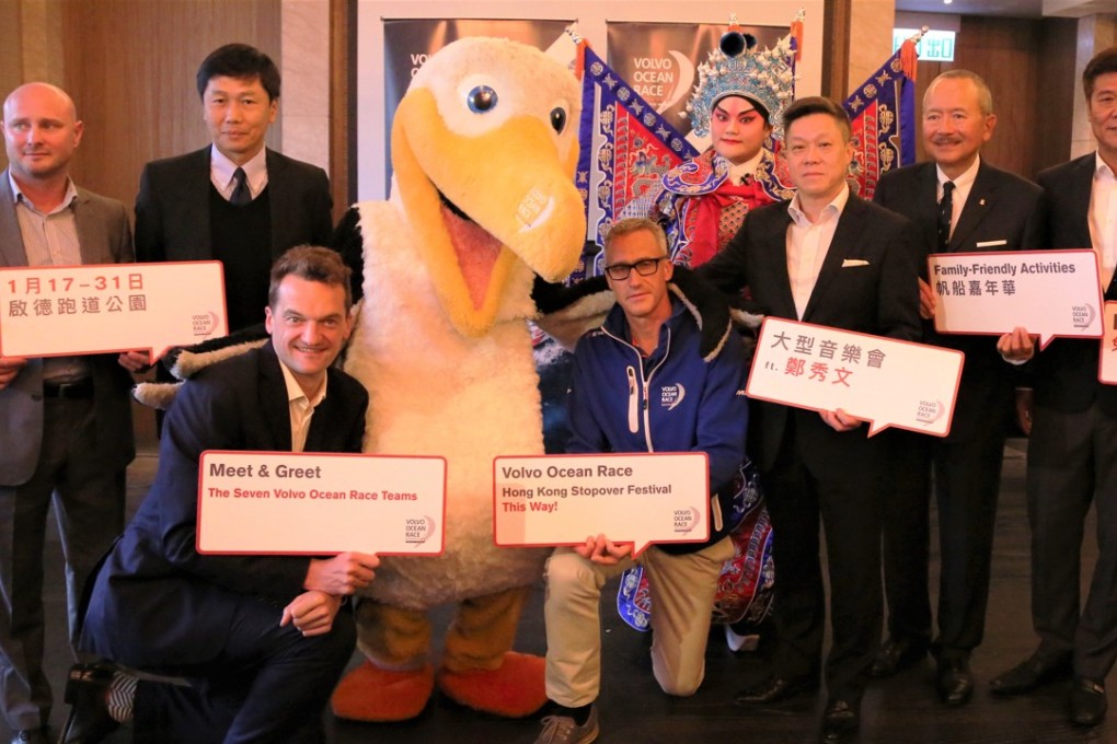 Organisers display signs to welcome visitors to the festival village on Monday. Photo: Chan Kin-wa