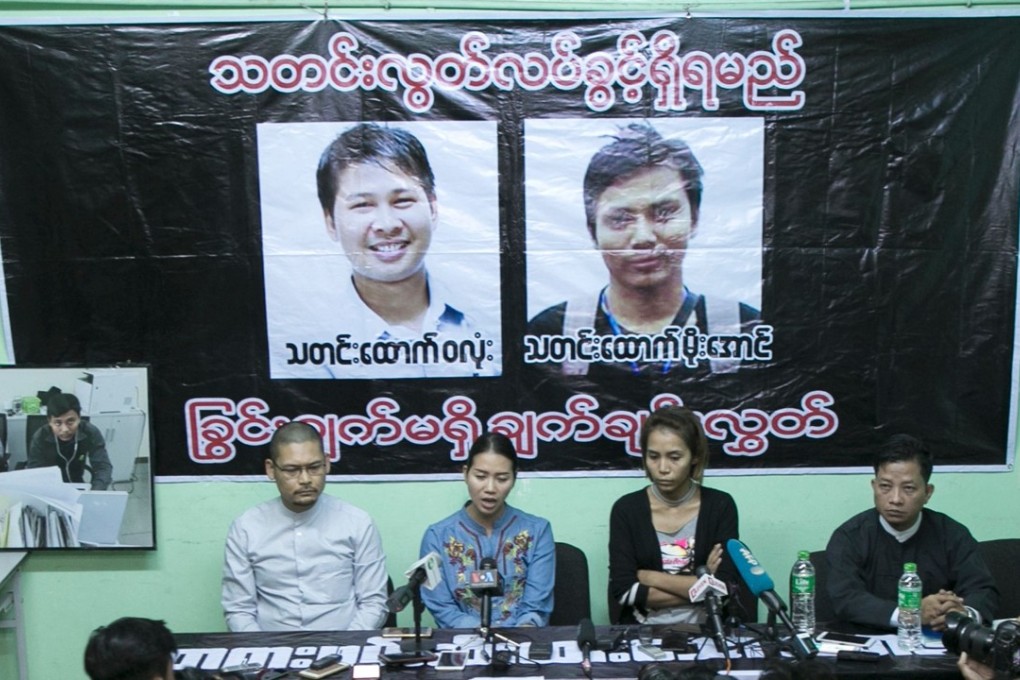 Pan Ei Mon, wife of Reuters journalist Wa Lone, and Nyo Nyo Aye, sister of Reuters reporter Kyaw Soe Oo, demand their loved ones be released. The two Reuters journalists face trial for charges relating to a colonial-era secrecy law that carries up to 14 years in jail. Photo: AFP