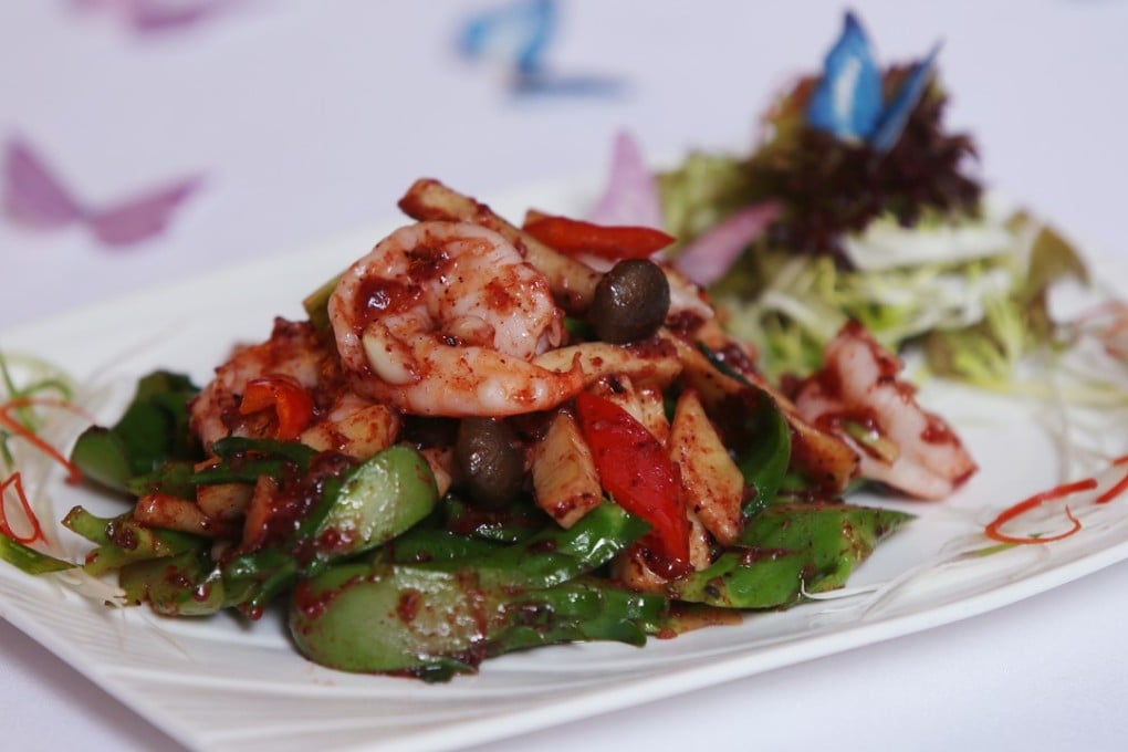 Pan-fried king prawns and clams with vegetables in red fermented wine paste at Zen in Wan Chai. Photo: Xiaomei Chen