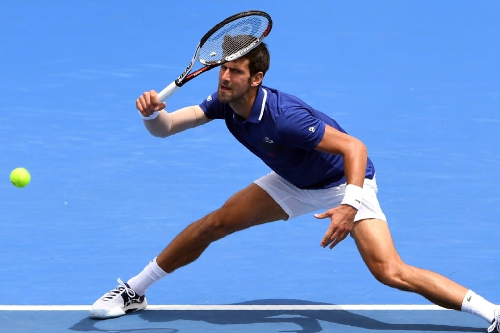 Novak Djokovic of Serbia hits a return during his match against Dominic Thiem of Austria at the Kooyong Classic in Melbourne. Photo: AFP