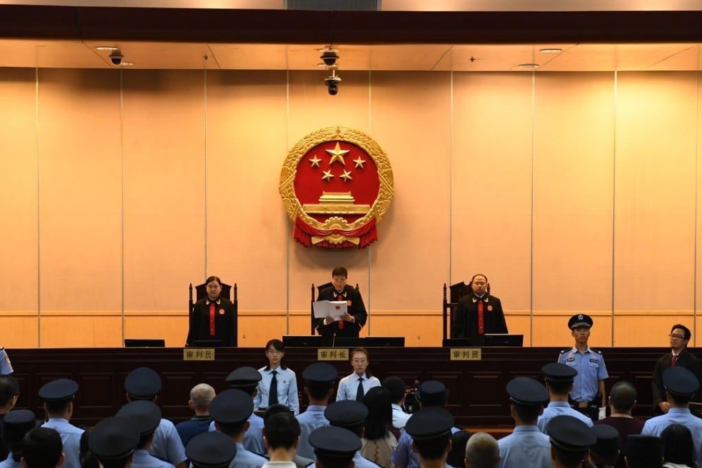 Twenty-six executives of a Chinese online peer-to-peer (P2P) lender are handed jail terms ranging from three years to life imprisonment for cheating the public out of large amount of money in Beijing. Two Chinese were sentenced to life by another court for a pyramid scheme. Photo: Xinhua