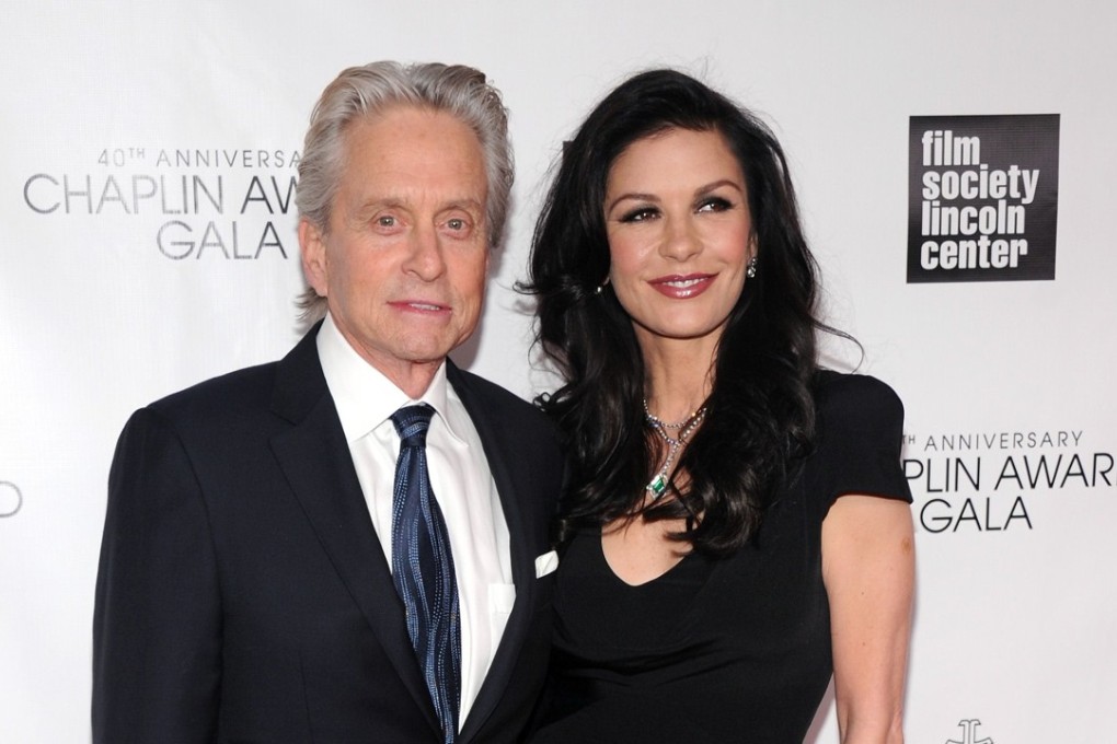 Michael Douglas with his wife, and Catherine Zeta Jones. Photo: AFP