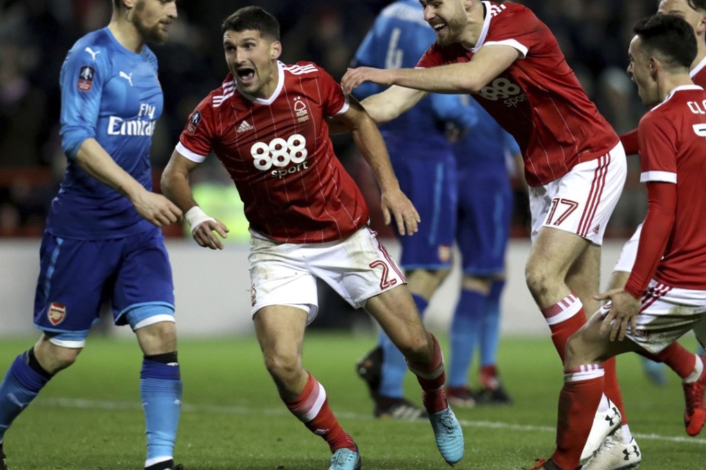 Nottingham Forest's Eric Lichaj (centre) celebrates scoring against Arsenal in the FA Cup third round. Photo: AP