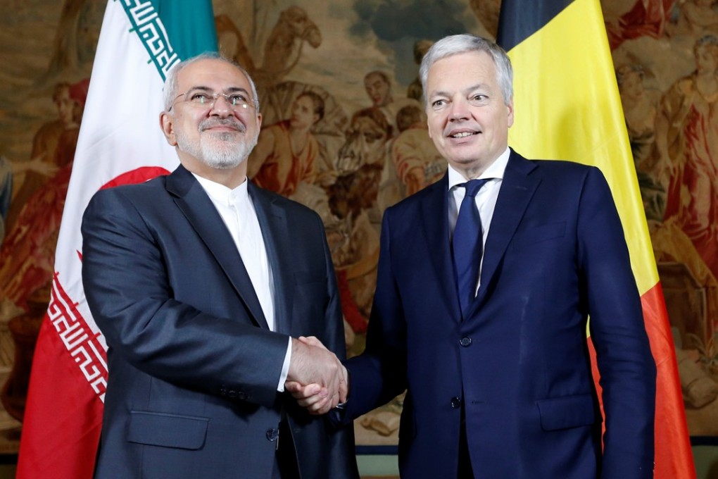 Belgian Foreign Minister Didier Reynders with his Iranian counterpart, Mohammad Javad Zarif. Photo: Reuters