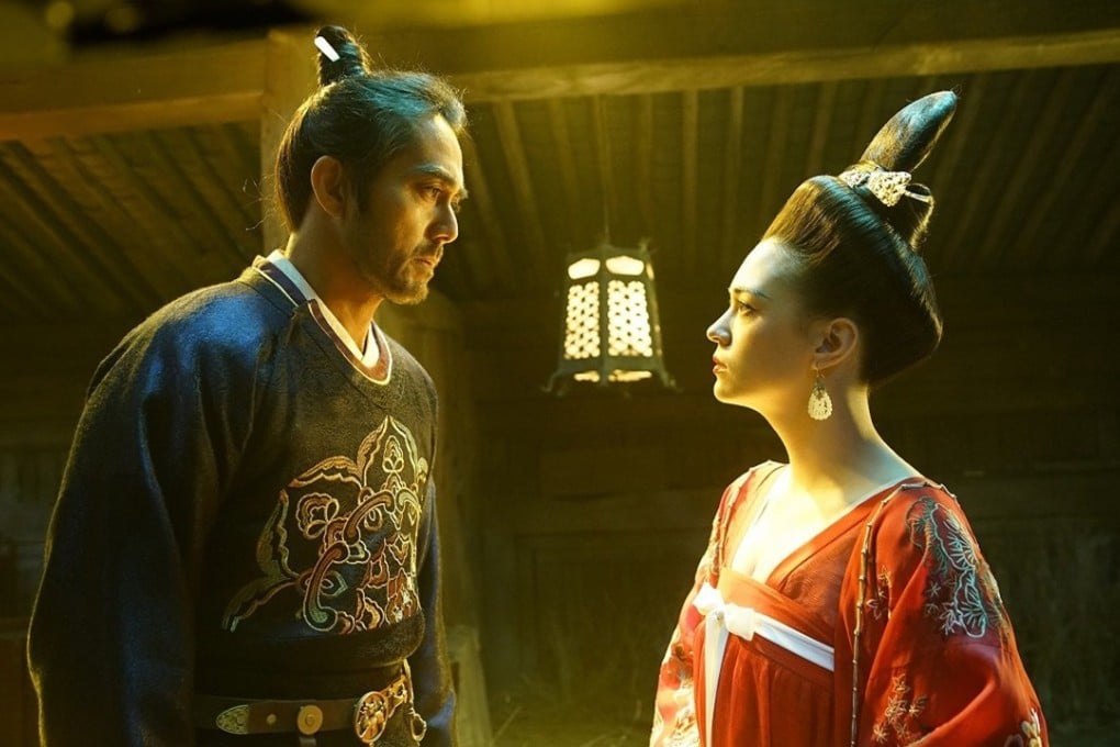 Hiroshi Abe (left) and Sandrine Pinna in a scene from Legend of the Demon Cat.