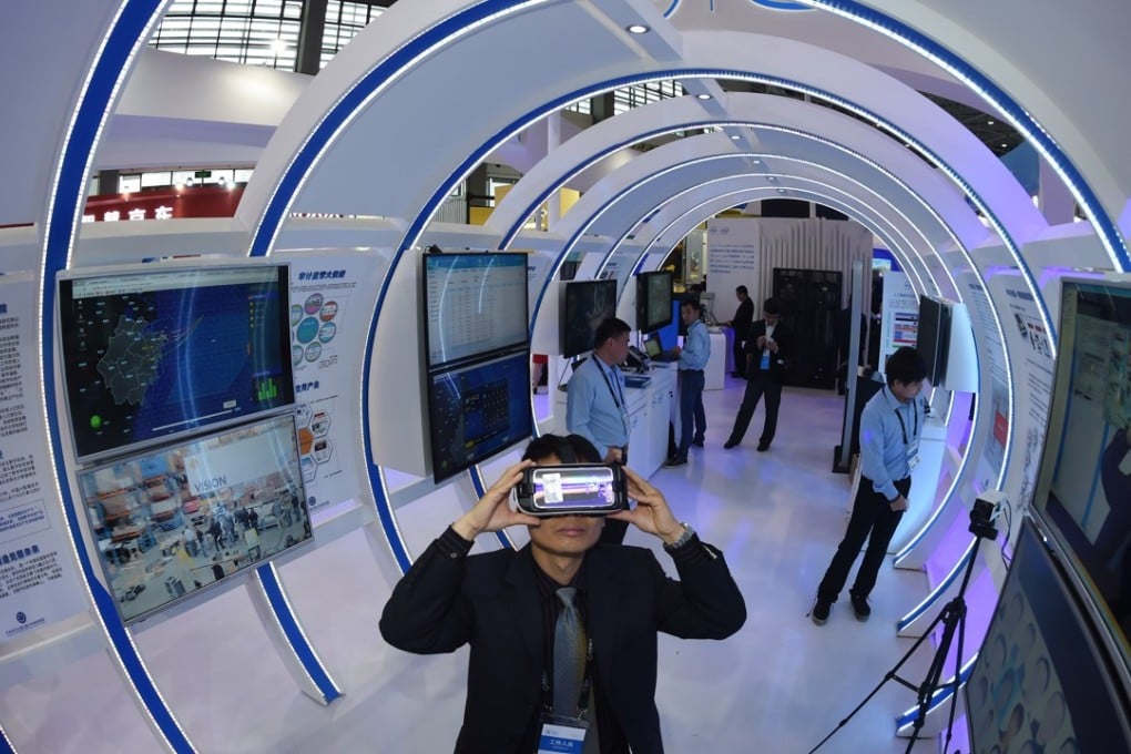 A visitor tests a virtual reality device at the International Big Data Expo in Guiyang, capital of Guizhou province in southwest China. One of the country’s poorest provinces, Guizhou is being transformed into a world-class hi-tech hub. Photo: Xinhua