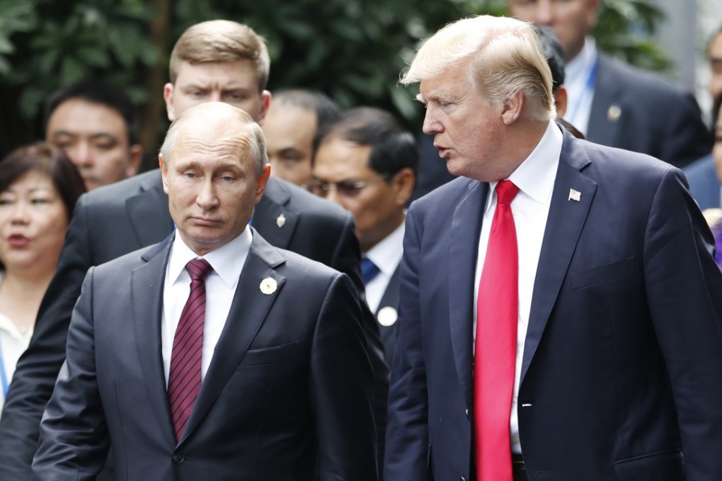 US President Donald Trump talks to Russian President Vladimir Putin in November last year at the APEC Summit in Da Nang, Vietnam. A sweeping new report by congressional Democrats warns of deepening Russian interference throughout Europe and concludes that Trump has offered no strategic plan to bolster their efforts or safeguard the US. Photo: AP