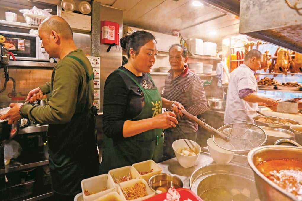 Chiu Chow Delicacies staff (from left) Li Wei Huang, Peng Bing, Lam Shek-hing and Ma Zhen Ting work in the restaurant’s kitchen in North Point. Photo: Xiaomei Chen