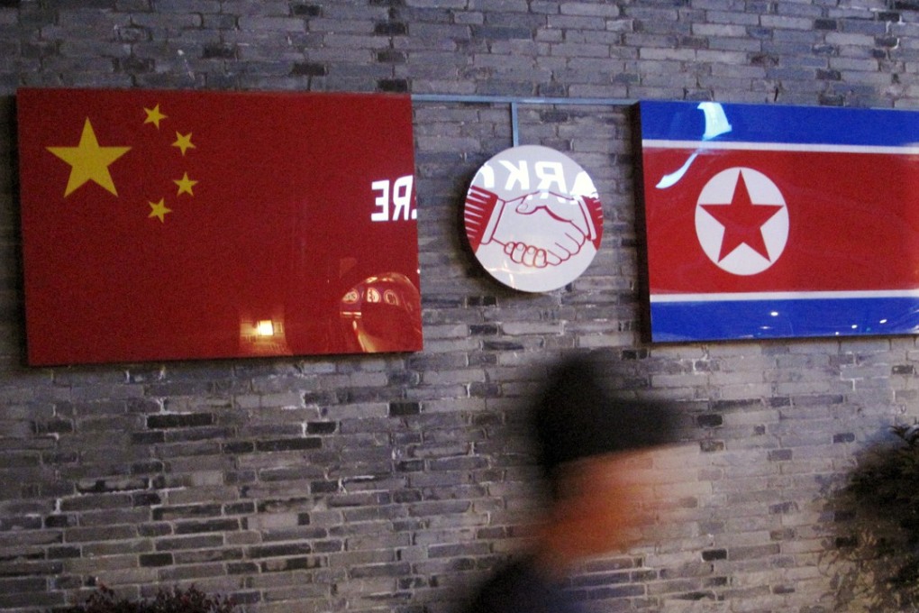 The flags of China and North Korea seen outside the closed Ryugyong Korean Restaurant in Ningbo in Zhejiang province. Photo: Reuters