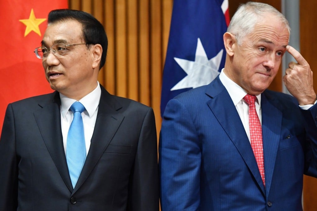 Premier of the State Council of the People's Republic of China Li Keqiang and Prime Minister of Australia Malcolm Turnbull attend a signing ceremony in Canberra, Australia. Photo: EPA