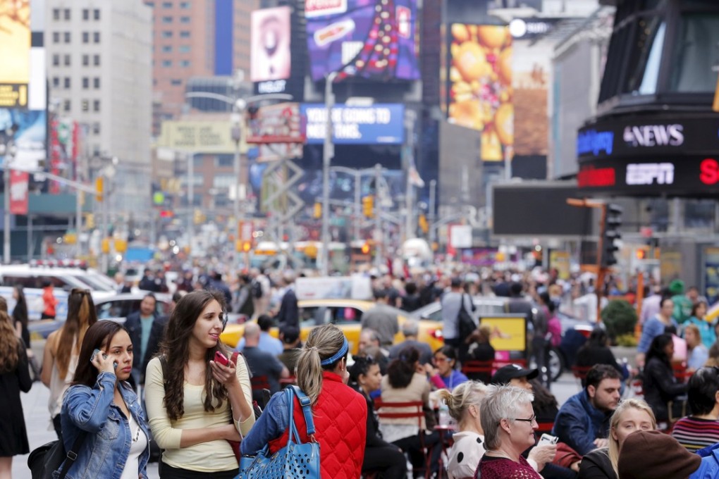 Pedestrians in New York’s popular Times Square. Photo: Reuters