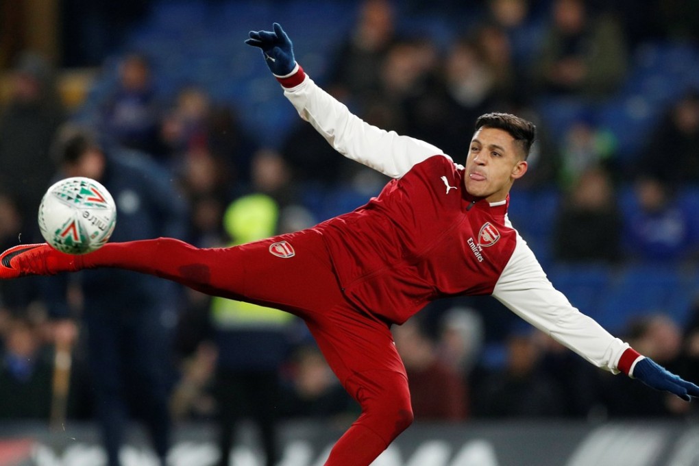 Alexis Sanchez warms up before Arsenal’s League Cup semi-final against Chelsea. Photo: Reuters