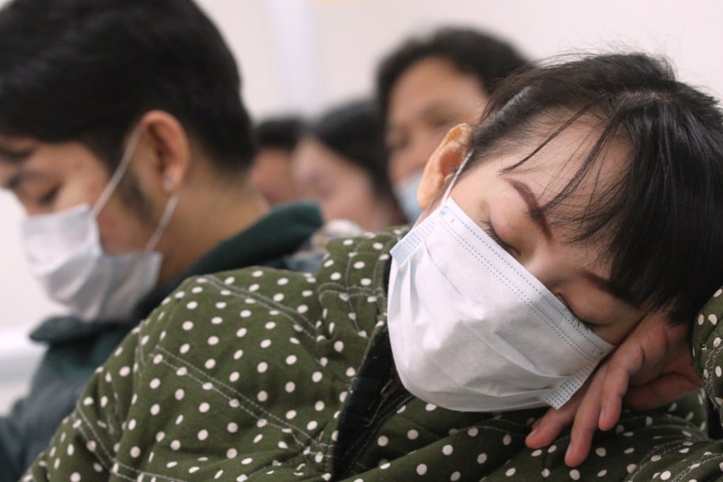 People wait for medical treatment at Queen Elizabeth Hospital in Yau Ma Tei. Photo: Edward Wong
