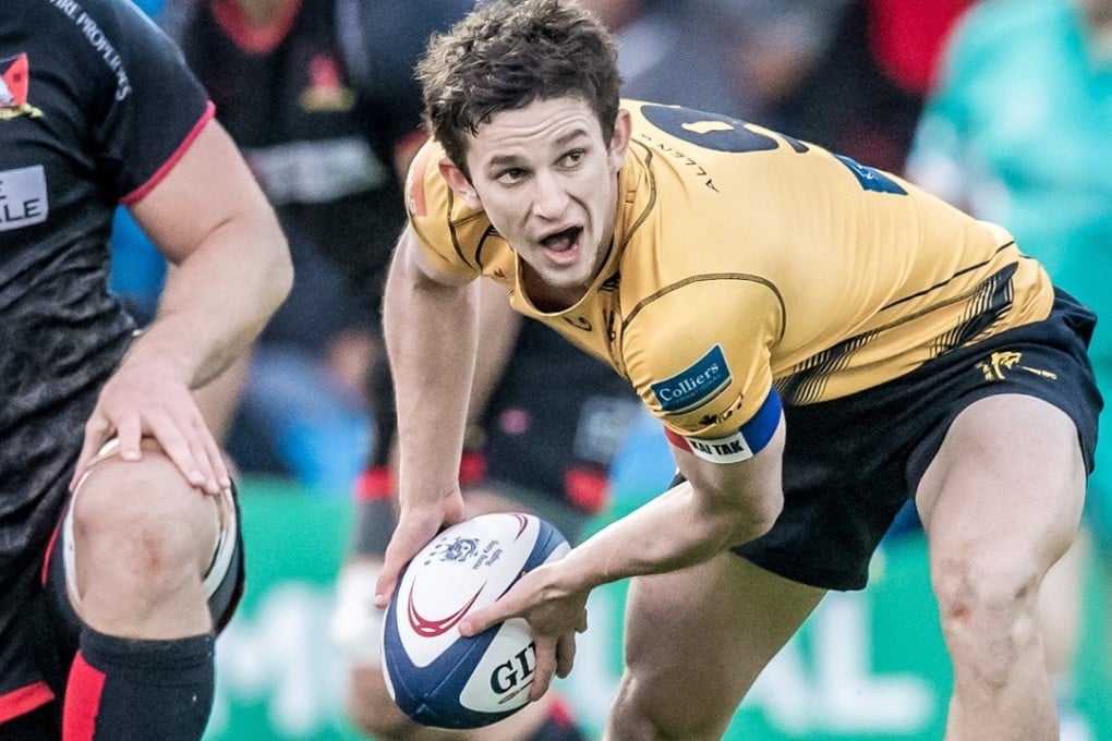 Josh Walden looks for options from the scrum. Photos: HKRU