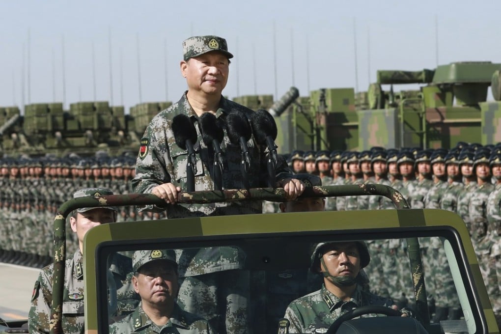 President Xi Jinping inspects troops of the People's Liberation Army during a military parade to commemorate the 90th anniversary of the founding of the PLA at Zhurihe training base in north China. Photo: Li Gang