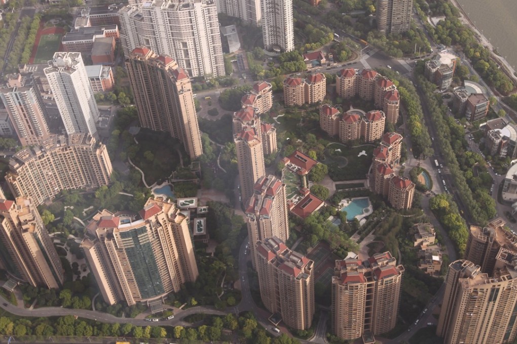 Residential buildings seen from The Shanghai Tower, a 128-storey skyscraper in the city’s Pudong district. Photo: Simon Song