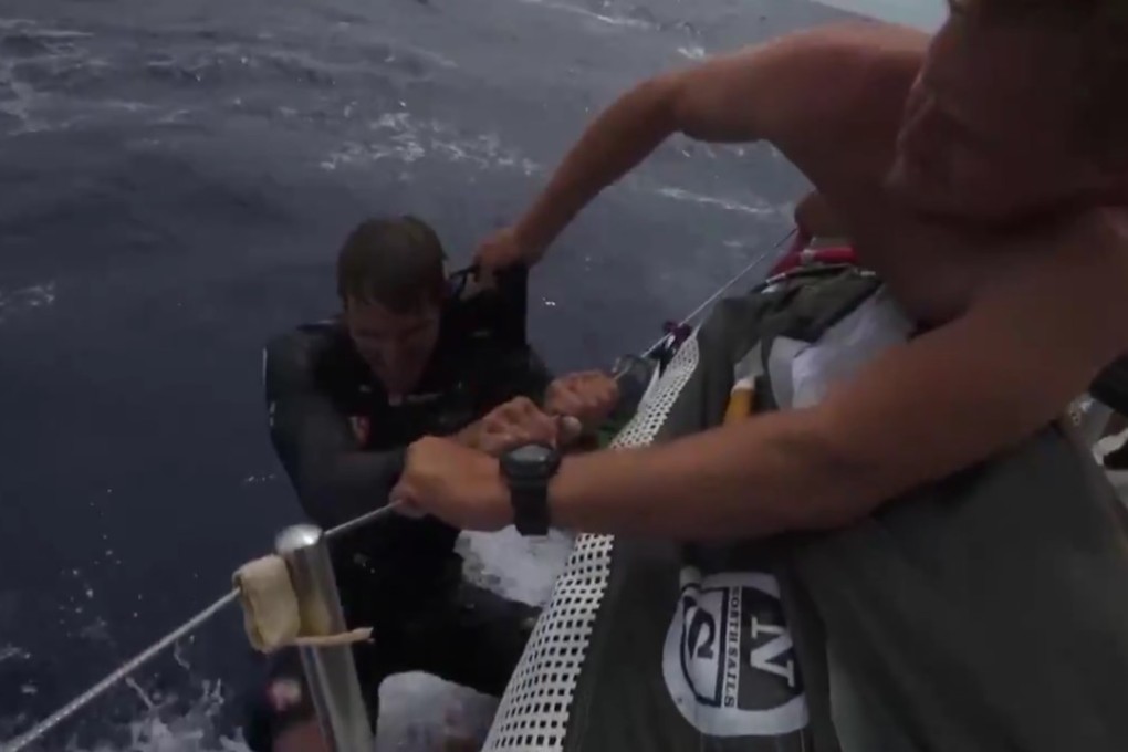 Crew member being rescued about Scallywag. Photo: Facebook