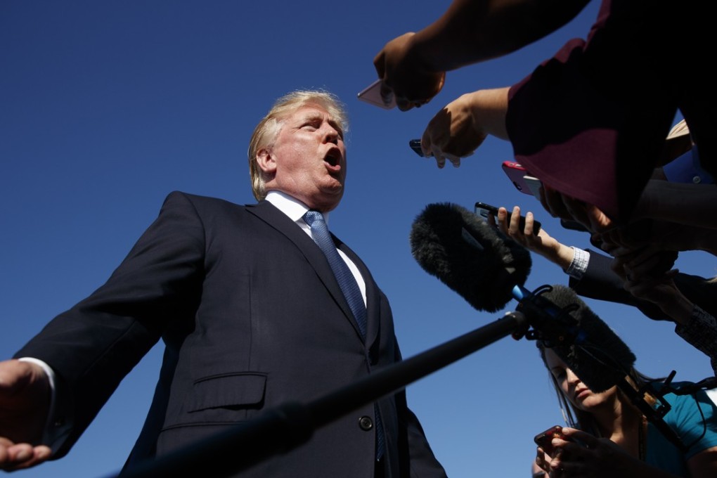 In this September 24, 2017, file photo, President Donald Trump speaks with reporters. He will be giving his ‘fake news’ awards this week, a move that one lawmaker said makes him similar to Soviet dictator Stalin. Photo: AP