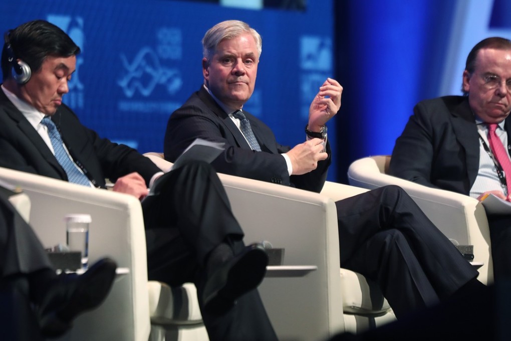 Deutsche Bundesbank board member Andreas Dombret (centre) at the Asian Financial Forum in Hong Kong on Monday with China Development Bank chairman Hu Huaibang (left) and HSBC chief executive Stuart Gulliver. Photo: Jonathan Wong