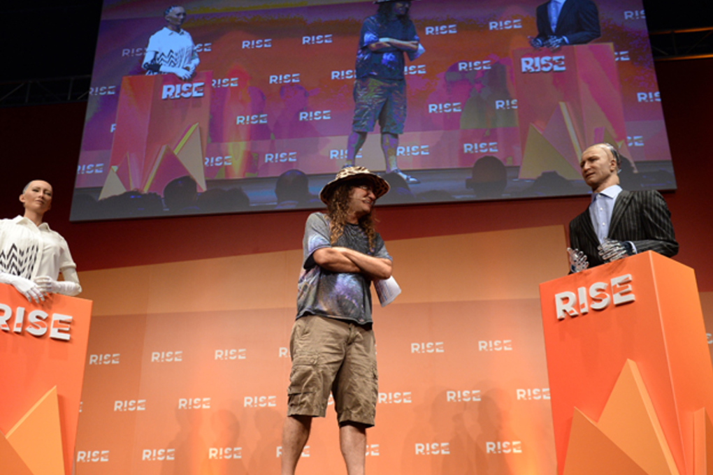 Hanson Robotics chief scientist Ben Goertzel, center, moderates a debate on the future of humanity between Sophia, left, and Han at the RISE 2017 technology conference in Hong Kong in this July 2017 file photo. Both Sophia and Han are humanoids made by Hanson Robotics. Photo: Connected Intelligence