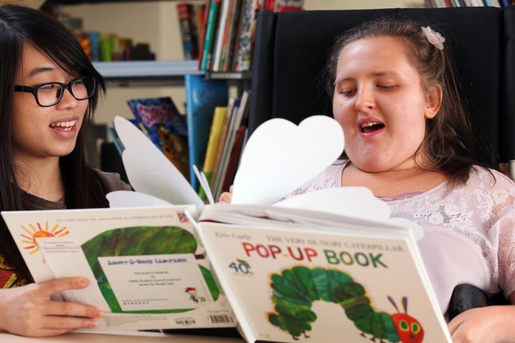 A special education needs student and her teacher at the Jockey Club Sarah Roe School. Photo: Dickson Lee