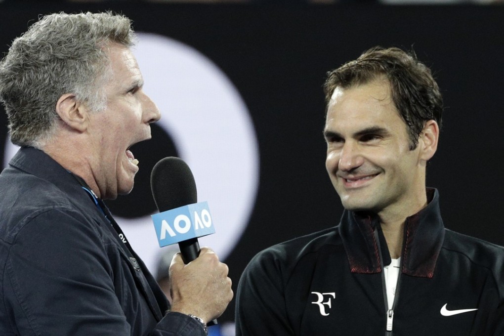 US actor Will Ferrell interviews Roger Federer on Rod Laver Arena following his first-round victory against Aljaz Bedene at the Australian Open. Photo: AP