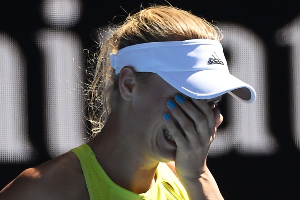 Caroline Wozniacki reacts after beating Croatia’s Jana Fett. Photo: AFP