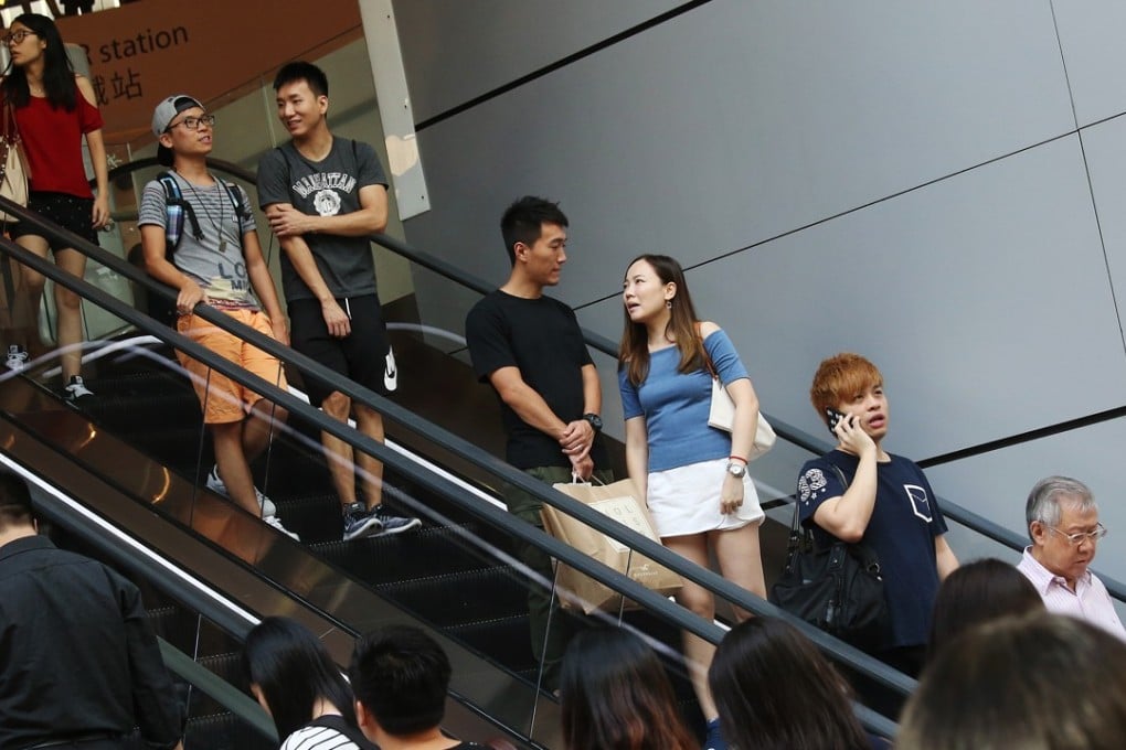 Mainland Chinese tourists are seen at shopping area in Causeway Bay during the 'Golden Week' holiday period. 02OCT17 SCMP / K. Y. Cheng