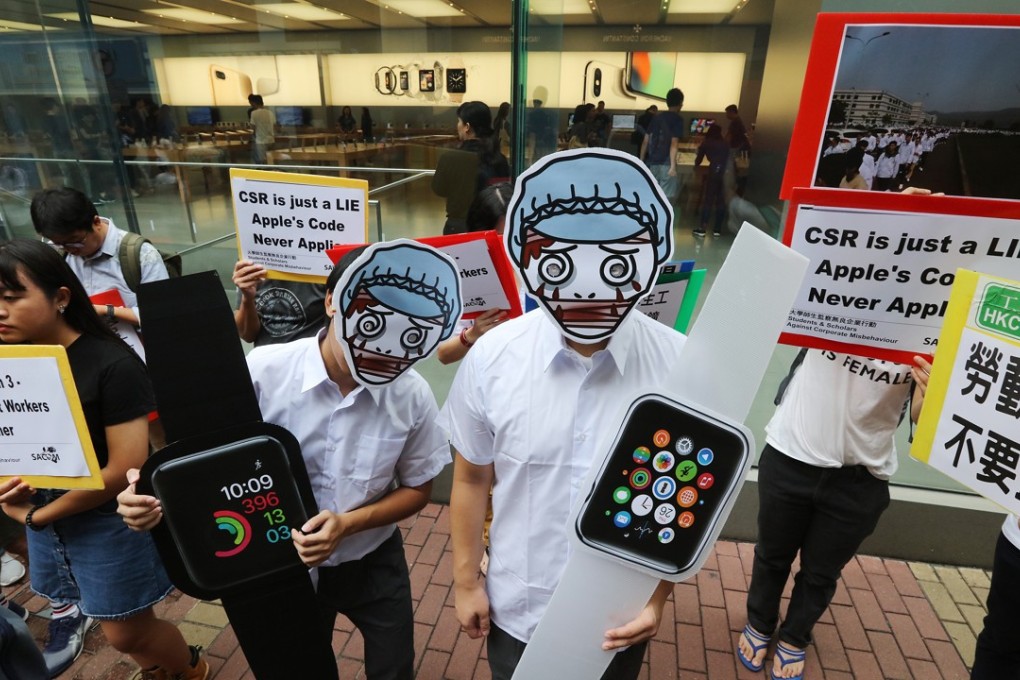 Members of Students and Scholars Against Corporate Misbehaviour depict sick factory workers in a protest outside an Apple Store in Causeway Bay, Hong Kong on September 22, 2017. Apple said it conducted a record 705 comprehensive site audits in 2016. Photo:Felix Wong