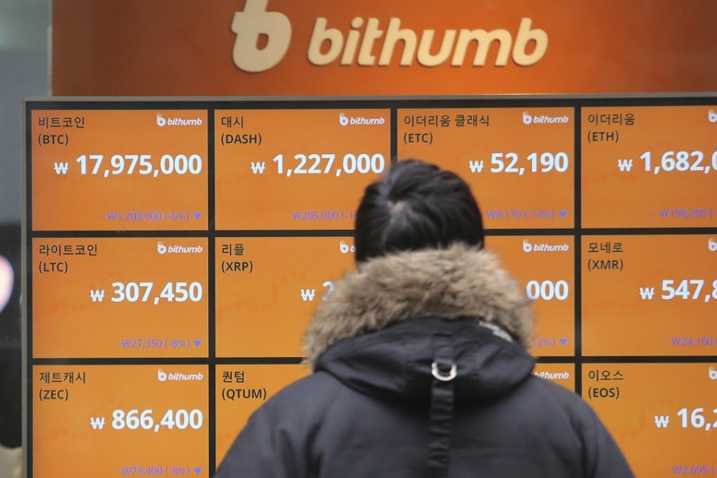 A man watches a screen showing the prices of bitcoin at a virtual currency exchange office in Seoul, South Korea, on January 16, 2018. Prices of bitcoin and other digital currencies have skidded after South Korea's top financial policymaker said a crackdown on trading of cryptocurrencies was still possible. Photo: AP