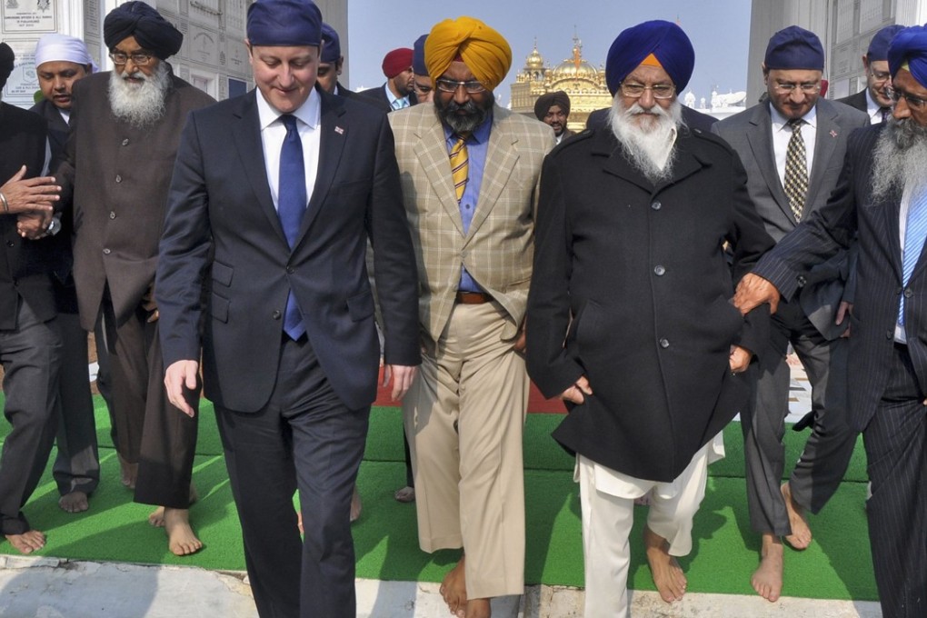 Former UK prime minister David Cameron in 2013 became the first British leader to voice regret about the Amritsar massacre of 1919. Photo: AFP