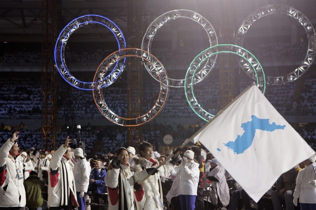 In 2006, athletes from North and South Korea marched into the Olympics together under a unification flag. Photo: AP