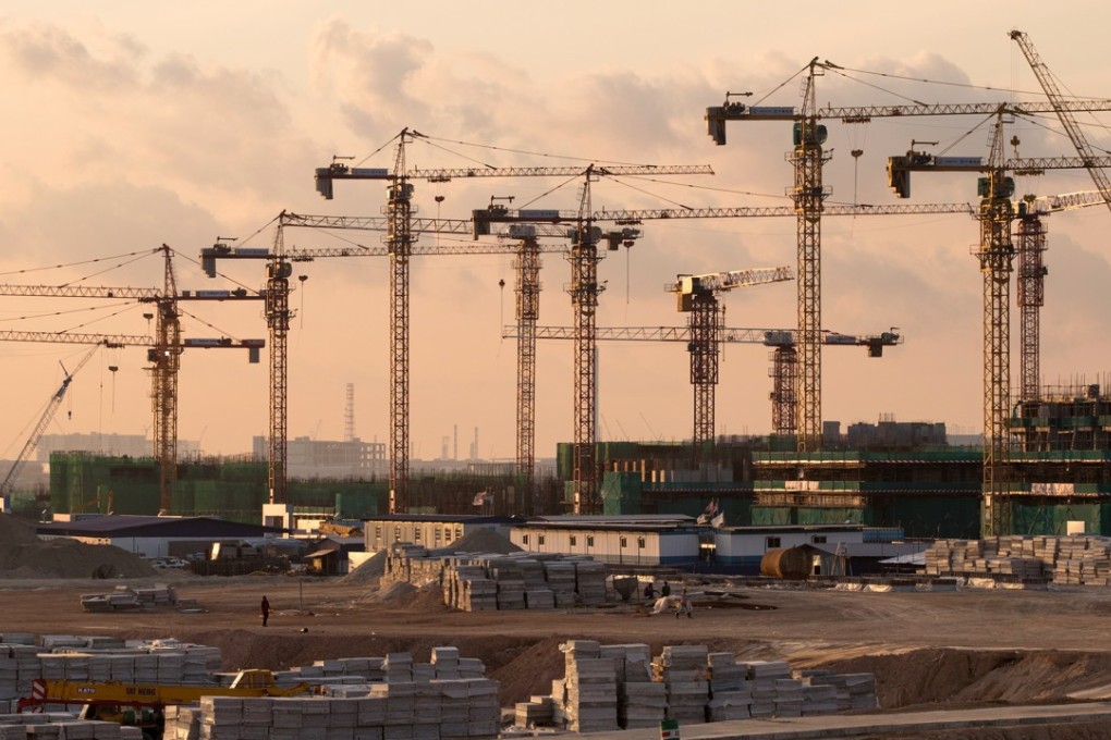 Cranes stand at a construction site in the Country Gardens Forest City development in the Iskandar Malaysia zone of Johor Bahru. Photo: Bloomberg