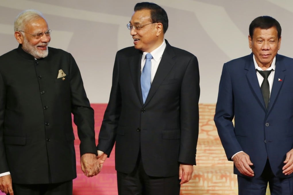 Indian Prime Minister Narendra Modi, Chinese Premier Li Keqiang and Philippine President Rodrigo Duterte take part in the East Asia Summit at the 31st Asean Summit in November in Manila. China’s rapid growth has brought opportunities for other Asian countries, India and Asean nations included, but also given neighbours concerns about its outsized influence. Photo: AP