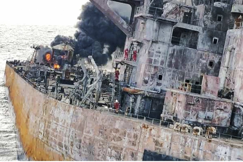 Rescuers boarded the stricken oil tanker on Saturday, recovering two bodies. The vessel sank on Sunday after an explosion. Photo: EPA-EFE