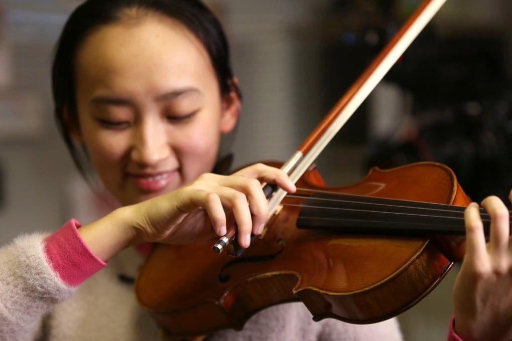 Ding Yijie, 17, has been completely blind for the past two years, but that does not stop her travelling to Hong Kong from her home in Foshan for music lessons. Photo: Xiaomei Chen