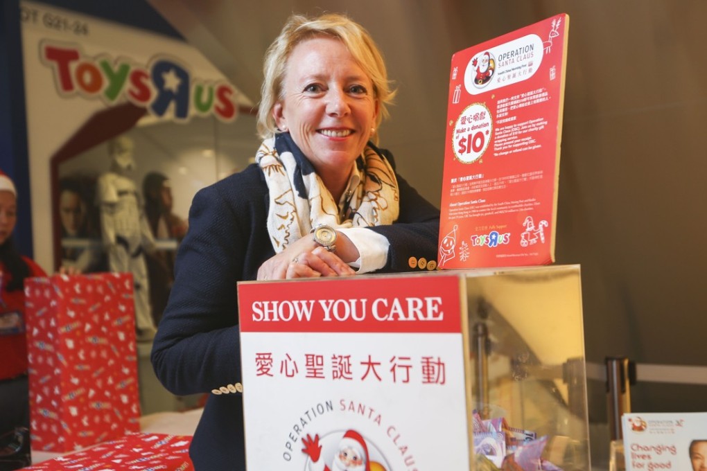 Toys R Us Chief Commercial Officer for Greater China & Southeast Asia, Jo Hall helps raise money during an Operation Santa Claus event. The cumulative total raised by Operation Santa Claus exceeded HK$260 million for more than 250 charities. Photo: Xiaomei Chen