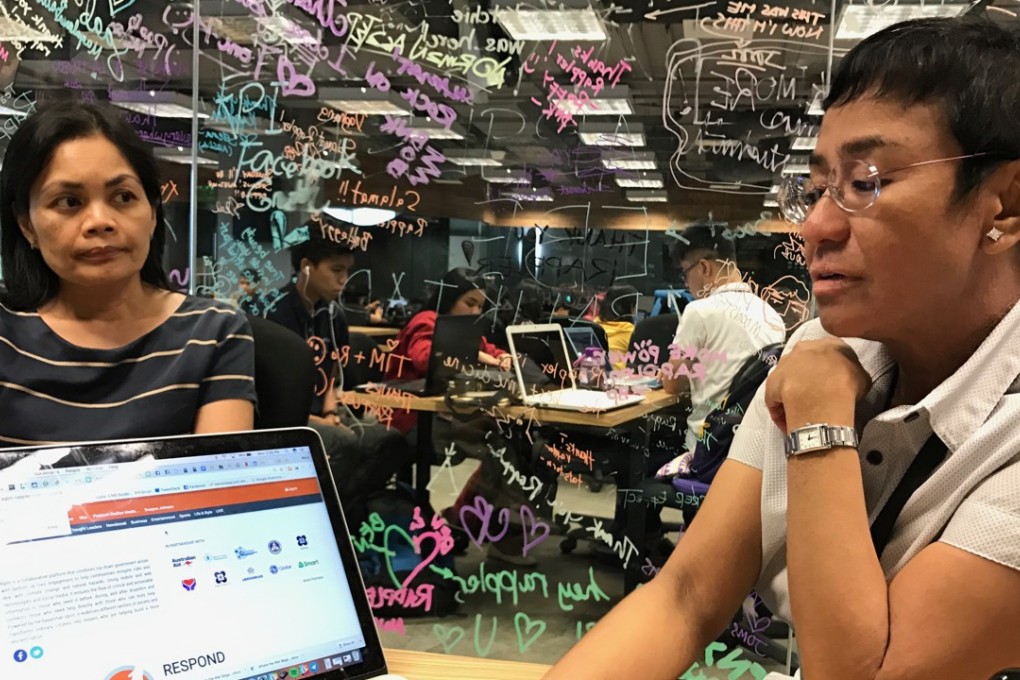 Rappler managing editor Glenda Gloria, left, and chief executive Maria Ressa in the newsroom. Photo: Cherian George