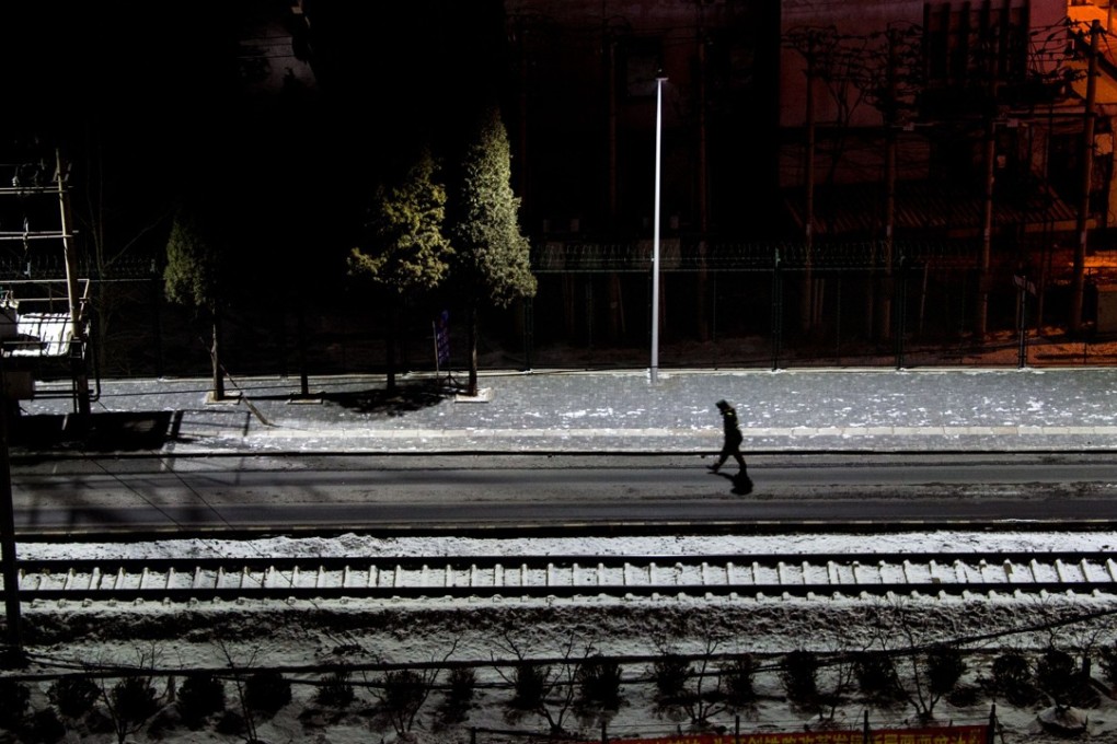 A Chinese soldier walks along railway tracks on the Friendship Bridge in Dandong, northeastern China. Beijing has ramped up security on its border with North Korea over the rising nuclear threat from Pyongyang. Photo: AFP